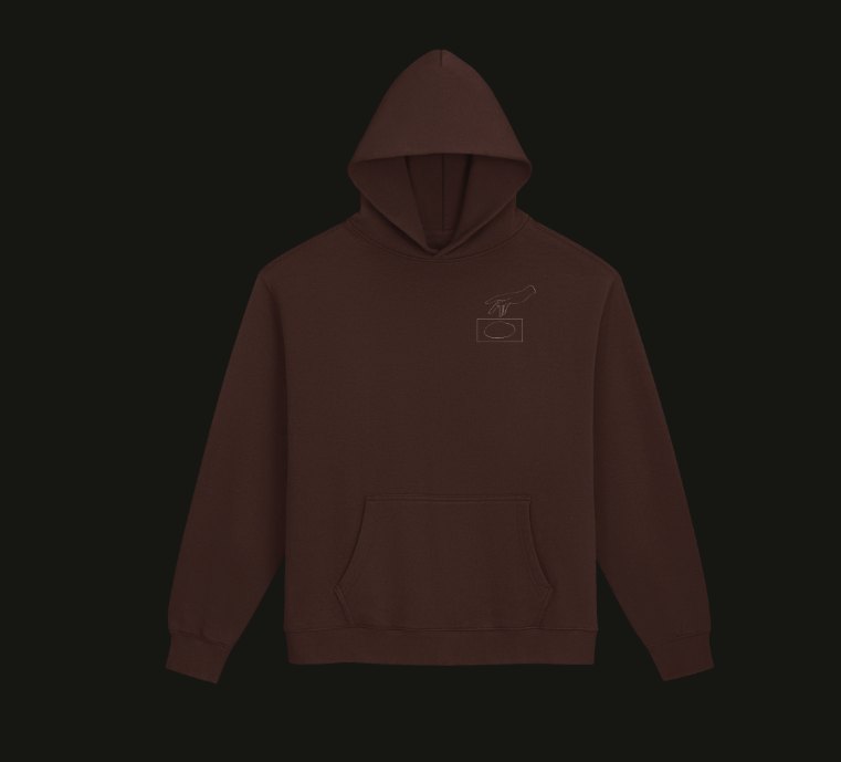 Chestnut Snoozin' hoodie with a small line drawing of a hand reaching for an alarm clock on the chest